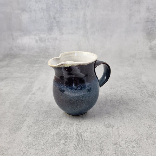 Blue Reactive & Tenmoku Milk Jug