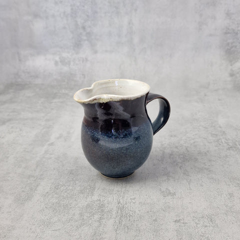 Blue Reactive & Tenmoku Milk Jug