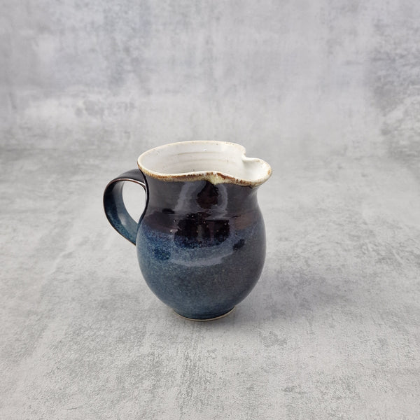 Blue Reactive & Tenmoku Milk Jug